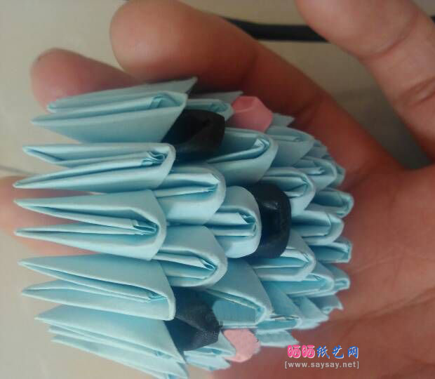 三角插可爱的章鱼宝宝手工折纸教程