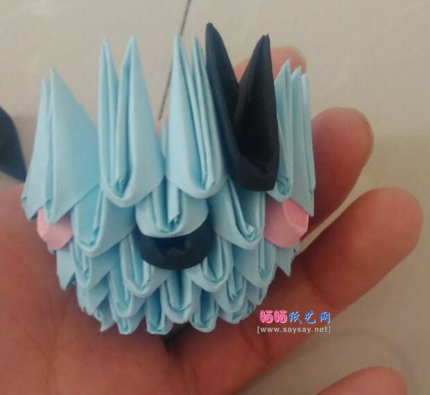 三角插可爱的章鱼宝宝手工折纸教程