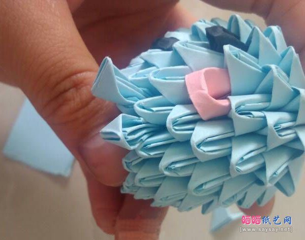 三角插可爱的章鱼宝宝手工折纸教程