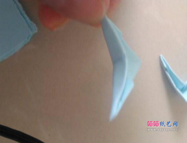 三角插可爱的章鱼宝宝手工折纸教程