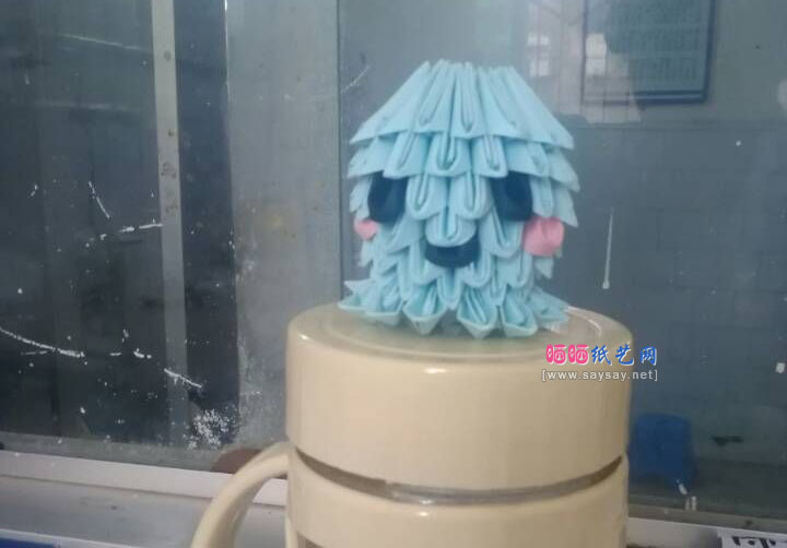 三角插可爱的章鱼宝宝手工折纸教程