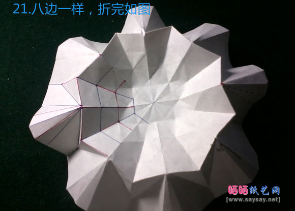 精致八瓣花手工折纸教程之款式四蓝色花朵折法图片步骤21